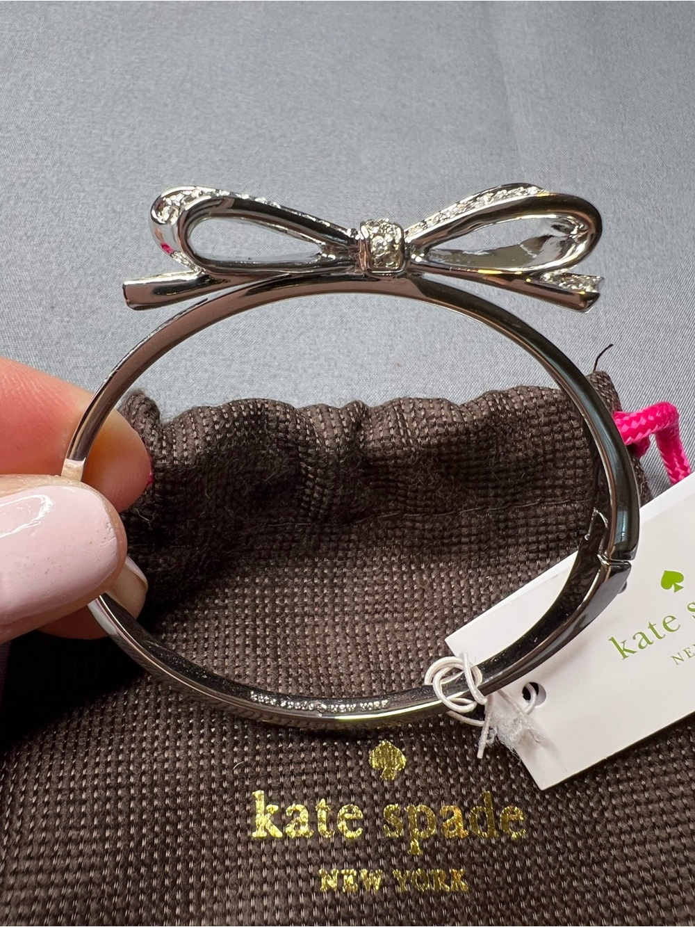 Kate Spade Love Notes Silvertone Crystal Pavé Bow Hinged Bangle Bracelet NWT